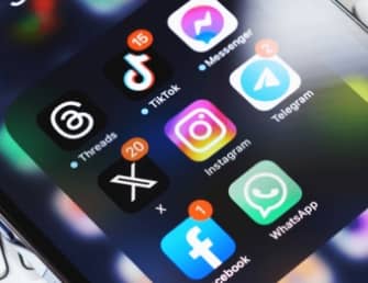 Firefly close up photography of a woman eyes, it eye lid is cover with flower with a colourful backg (2)